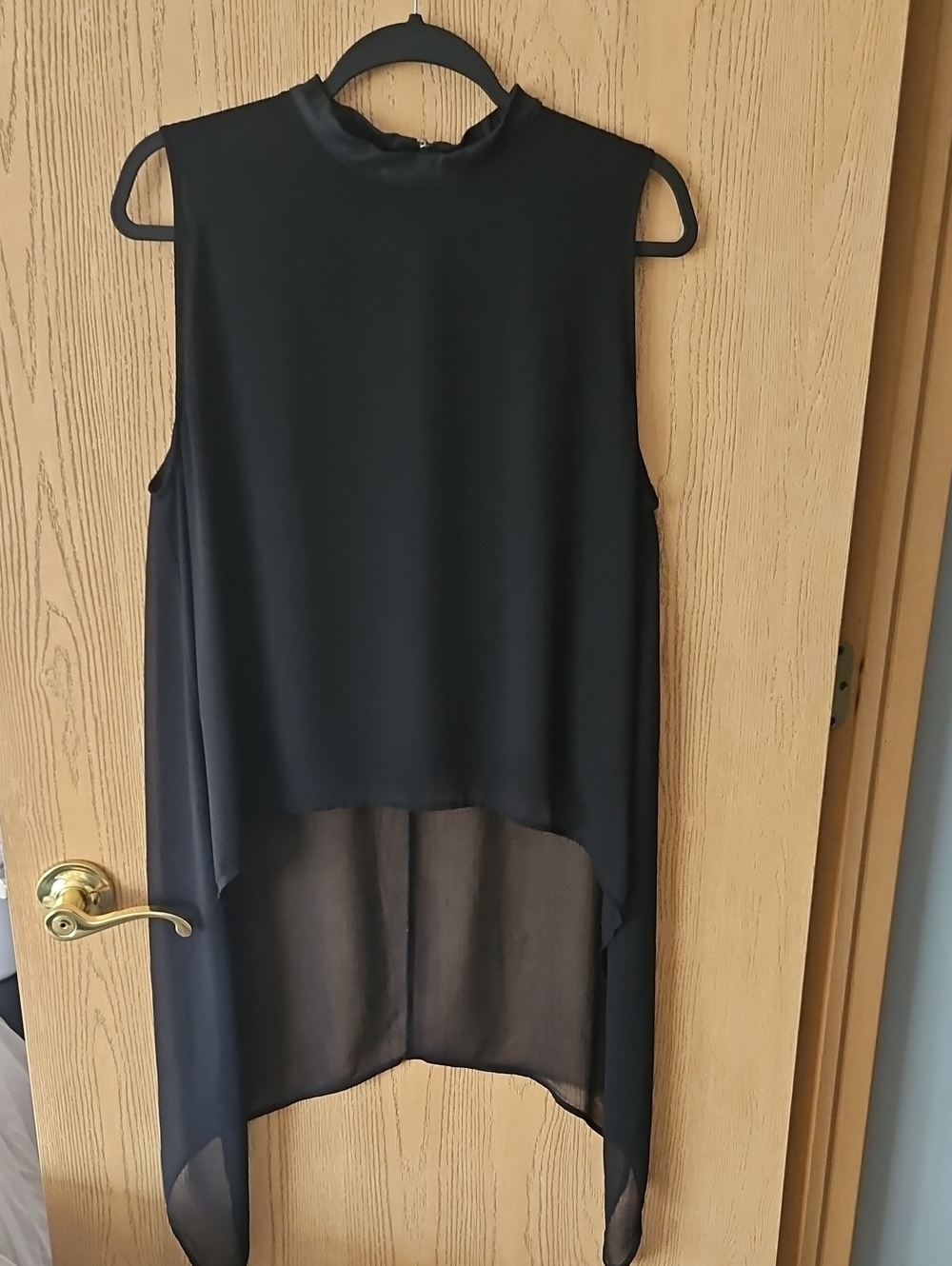 Divided Black Sleeveless Hi-Low Chiffon Blouse